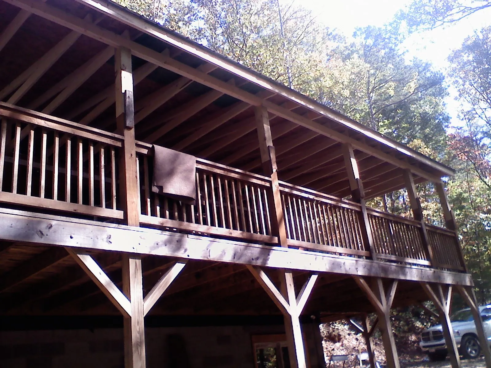 Timber framing under a new elevated porch and deck — Roof Leak Repair in Chimayo by Roofing Brothers